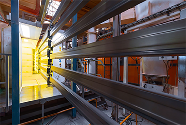 Components entering a spray booth.