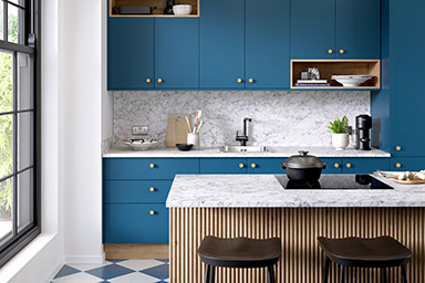Options kitchen worktops from Bushboard: mid blue cupboard fronts.