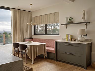 Et Lorem kitchen diner highlighting the dining area including the banquette seating.