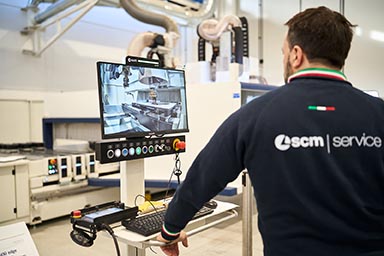 A man monitoring the control screen for an Accord 500 Edge CNC machining centre.