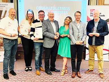 Winners of the Roofscape Design Awards with their prizes.