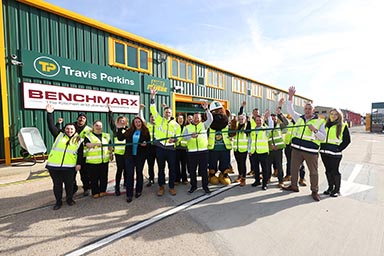 Staff in hi-vis jackets outside the new Travis Perkins branch in Leytonstone.