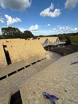 Construction in progress at the Apex Timber Frame project using SterlingOSB Zero from West Fraser.